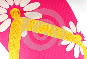 Pink and yellow flip flop