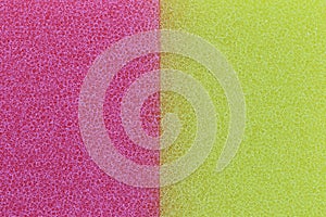 Pink and Yellow sponge surface background.