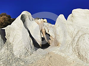 Pinkish-white sandstone cliffs and landforms at St Bathans in Otago region of the South Island of New Zealand photo