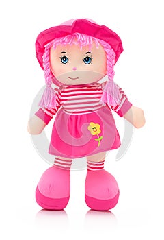 Pinky plushie doll isolated on white background with shadow reflection. Nice contemporary rag baby with pink hair.