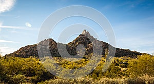 Pinnacle Peak rock formation in desert landscape photo