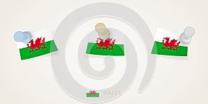 Pinned flag of Wales in different shapes with twisted corners. Vector pushpins top view