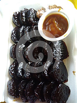 pinoy kakanin kutsinta with caramel sauce photo