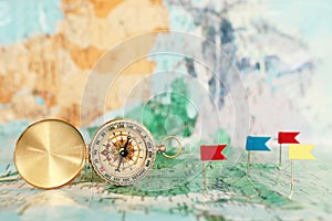 Pins attached to map, showing location or travel destination . retro style image. selective focus