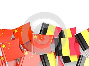 Pins with flags of China and belgium isolated on white