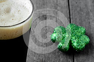 Pint of Stout Beer with Green Shamrock
