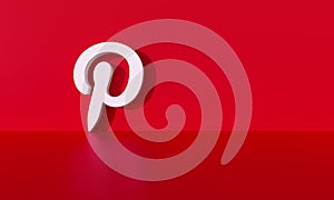 Pinterest logo on red wall background with hard shadow and space for text and graphics. artist