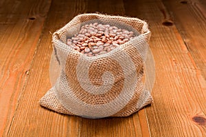 Pinto beans in burlap bag