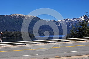 San Martin de los Andes -Argentina asphalt route without people -Lakar lake background with mountain in summe photo