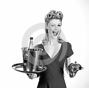 Pinup catering waiter with champagne and service tray. Restaurant serving presentation concept.