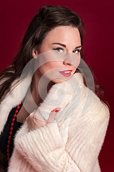 Pinup Girl in Creamy Fur Coat