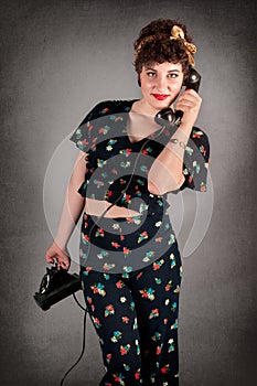 Pinup Girl in Flowered Outfit On Phone