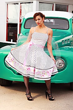 Pinup Girl in Front of Retro Truck