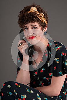 Pinup Girl Frustrated on Old Fashioned Telephone