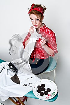 Pinup girl ironing accident