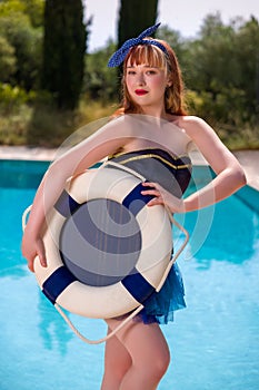 Pinup girl with swim ring