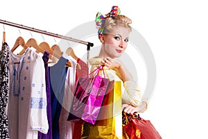 Pinup woman with shopping bags and hanger