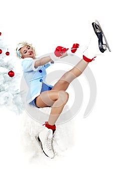 Pinup woman in winter style with skates.