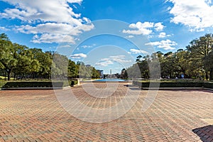 The Pioneers memorial obelisk on the end of reflection pool at Hermann Park Houston Texas USA