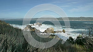 Piont Lobos pan left slow motion scenic landscapes of Big Sur coast of the pacific ocean