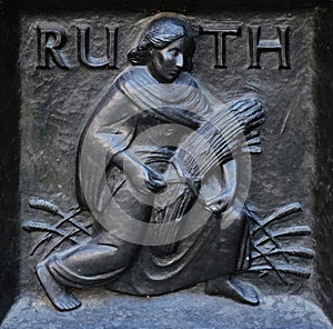 The pious Ruth, relief on the door of the Grossmunster church in Zurich photo