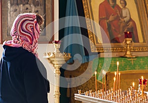 Pious woman praying photo