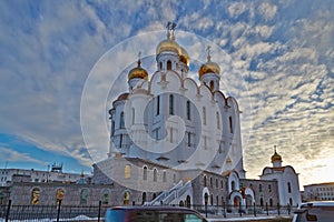 Piously-Troitsk cathedral on a decline in clouds. Magadan. Winter