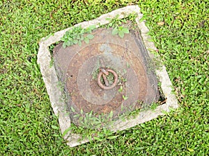 Pipe cap on the lawn