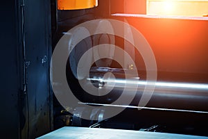 Pipe formation by using roll bending machine, close up