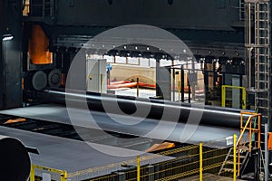 Pipe formation by using roll bending machine, close up