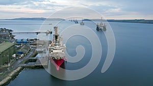 Pipe Laying Ship Docked at Port Loading Equipment