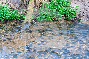 Pipe on the river