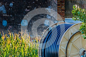 Pipe to irrigate the fields wound on the spool