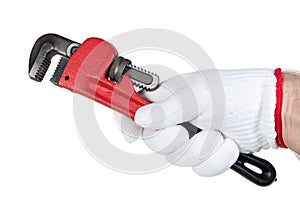 Pipe wrench in hand in protective glove on white background