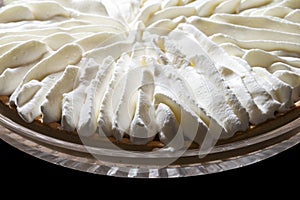 Piped chantilly cream on a tart photo
