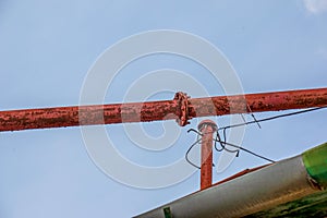 Pipeline against the blue sky. The old building of the brewery in the city of Nitra, Slovakia