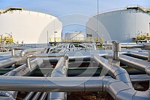 Pipeline,storage tanks and buildings of a refinery - industrial plant for fuel production