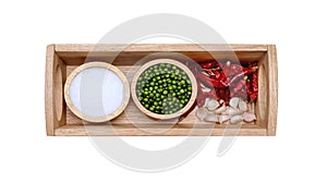 Piper nigrum black pepper , salt in wood bowl box and red hot chili garlic for  Thai food seasoning isolated on white background