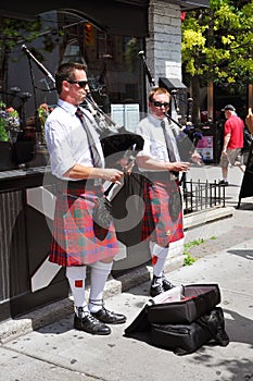 Pipers outside a bistro in downtown Ottawa