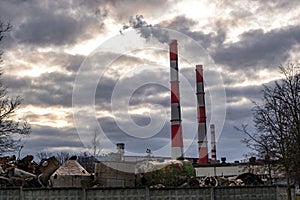 Pipes of a chemical enterprise plant. Air pollution concept. Industrial landscape environmental pollution waste of thermal power