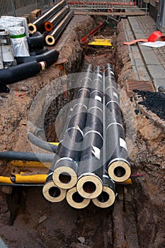 Pipes in dug up street photo