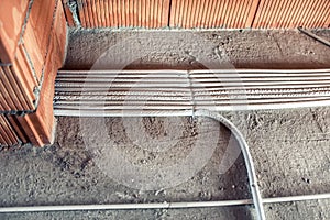 Pipes and heating system at house construction site. floor heating system, the collector