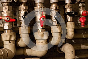 Pipes and levers controls central heating system of house