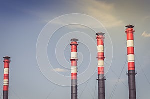 Pipes of plant against background of sky/pipes of plant against