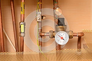 Pipes and pressure gauge