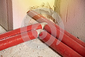 pipes in red isolation on construction site