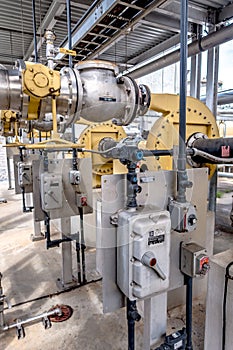 Pipes, tubes, machinery and steam turbine at a power plant