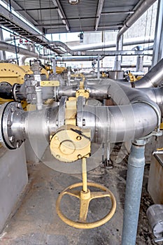 Pipes, tubes, machinery and steam turbine at a power plant