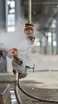 Pipes and valves, large amounts of steam, hydraulic system bursting