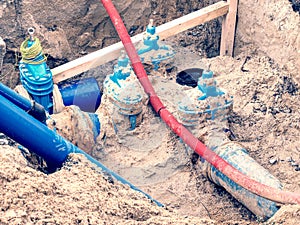 Pipes and valves underground. Repare of water supply interruption. Drink water piping